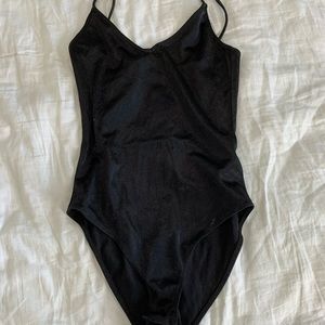 Satin black body suit